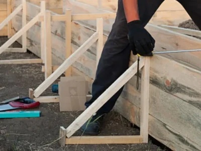 Plywood concrete forms aligned and staked for residential footing