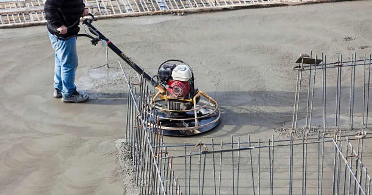 Power trowel machine finishing large commercial concrete floor