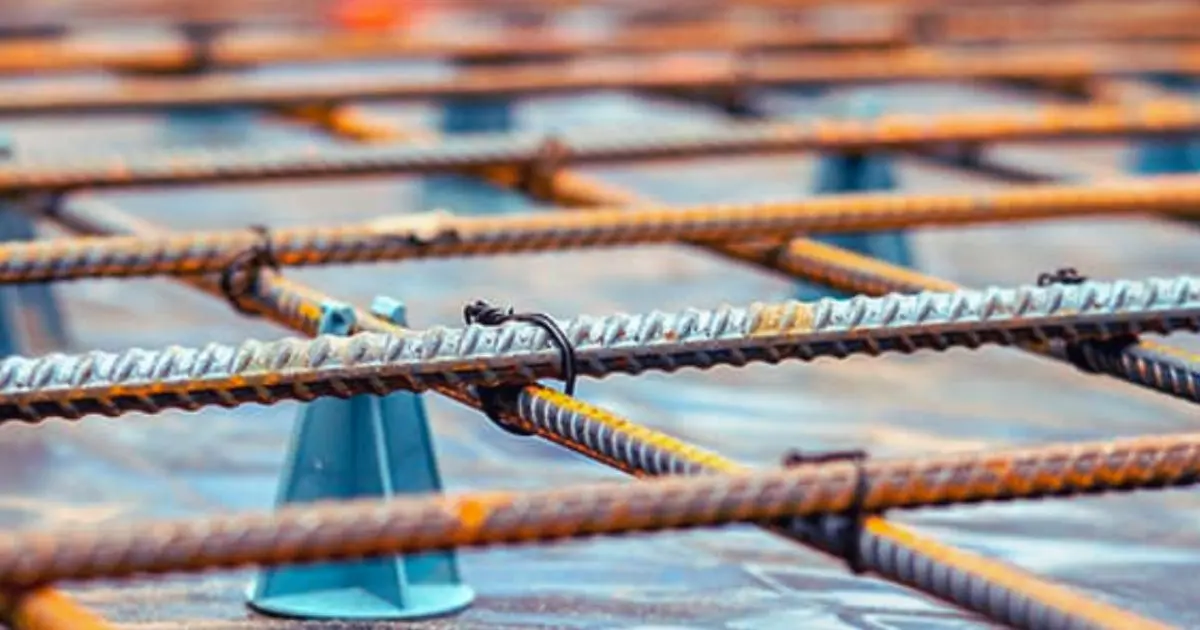 Close-up of rebar spacing and chair supports in concrete slab formwork
