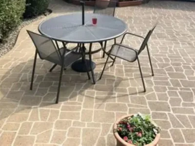 Stenciled decorative concrete patio with tile pattern and color accents